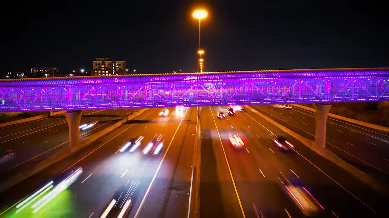 Illuminated bridge photographed at night